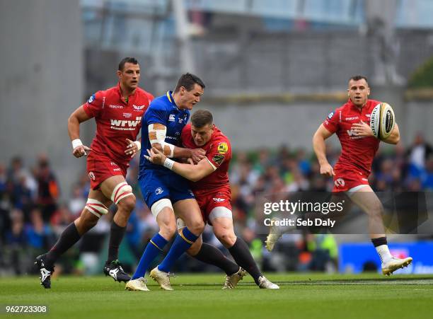 Dublin , Ireland - 26 May 2018; Jonathan Sexton of Leinster is tackled by Scott Williams of Scarlets during the Guinness PRO14 Final between Leinster...