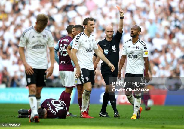 Denis Odoi of Fulham is shown a red card by referee during the Sky Bet Championship Play Off Final between Aston Villa and Fulham at Wembley Stadium...