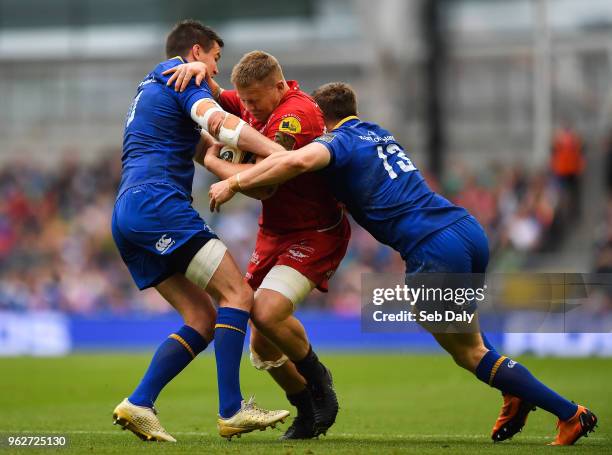 Dublin , Ireland - 26 May 2018; James Davies of Scarlets is tackled by Jonathan Sexton, left, and Garry Ringrose of Leinster during the Guinness...