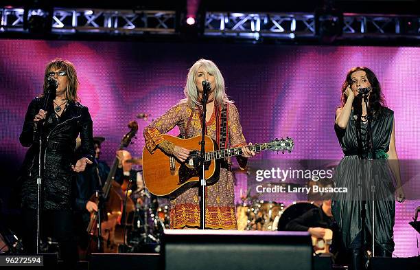 Musician Emmylou Harris performs onstage at the 2010 MusiCares Person Of The Year Tribute To Neil Young at the Los Angeles Convention Center on...