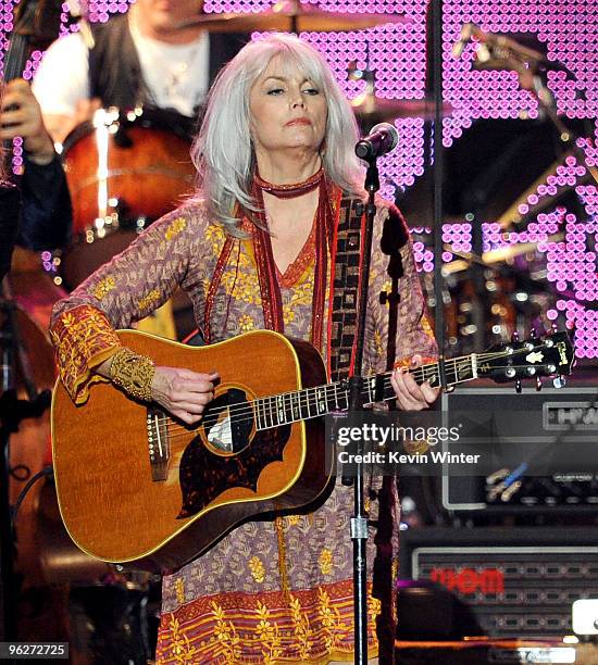 Musician Emmylou Harris performs onstage at the 2010 MusiCares Person Of The Year Tribute To Neil Young at the Los Angeles Convention Center on...