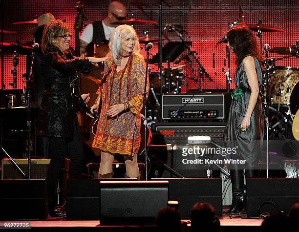Musician Emmylou Harris performs onstage at the 2010 MusiCares Person Of The Year Tribute To Neil Young at the Los Angeles Convention Center on...