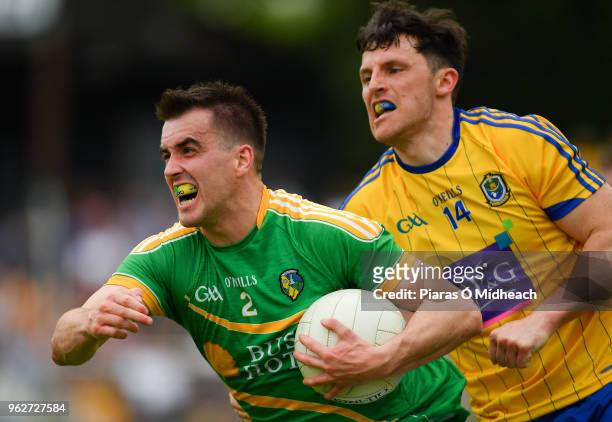 Leitrim , Ireland - 26 May 2018; Paddy Maguire of Leitrim in action against Diarmuid Murtagh of Roscommon during the Connacht GAA Football Senior...