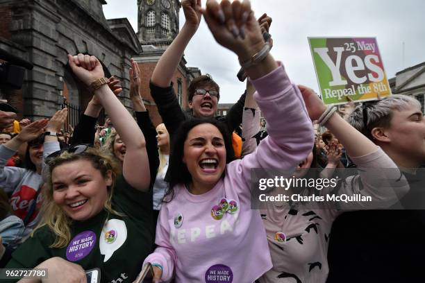 Yes voters celebrate as the result of the Irish referendum on the 8th amendment, concerning the country's abortion laws, is declared at Dublin Castle...