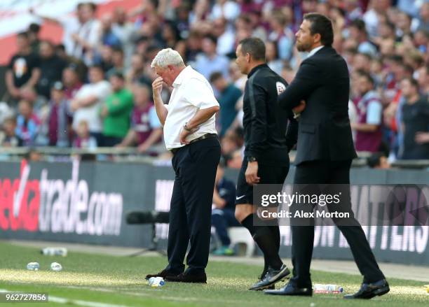 Steve Bruce, Manager of Aston Villa reacts during the Sky Bet Championship Play Off Final between Aston Villa and Fulham at Wembley Stadium on May...