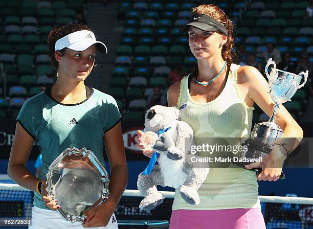 Laura Robson of Great Britain and Karolina Pliskova of the Czech Republic pose with their trophies after the junior girls' singles final match during...