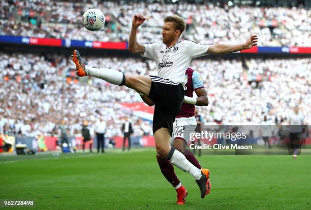 Tim Ream of Fulham clears the ball during the Sky Bet Championship Play Off Final between Aston Villa and Fulham at Wembley Stadium on May 26, 2018...