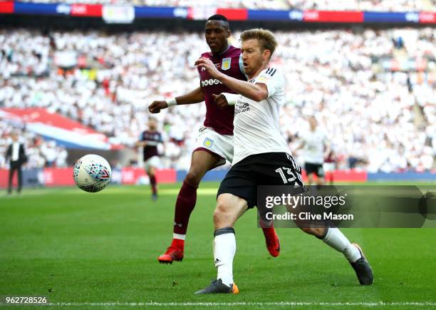 Tim Ream of Fulham looks to clear the ball during the Sky Bet Championship Play Off Final between Aston Villa and Fulham at Wembley Stadium on May...
