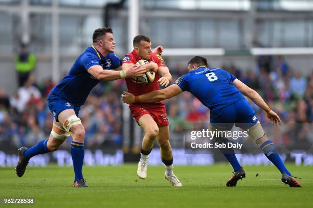 Dublin , Ireland - 26 May 2018; Gareth Davies of Scarlets is tackled by James Ryan, left, and Jack Conan of Leinster during the Guinness PRO14 Final...