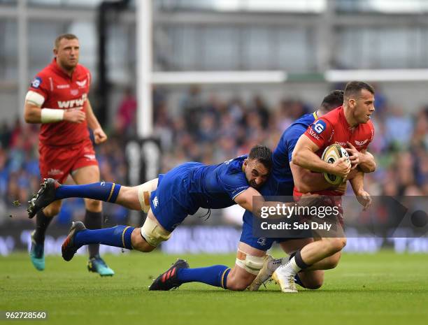 Dublin , Ireland - 26 May 2018; Gareth Davies of Scarlets is tackled by James Ryan, left, and Jack Conan of Leinster during the Guinness PRO14 Final...