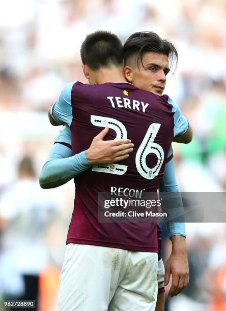 John Terry of Aston Villa consoles Jack Grealish of Aston Villa after their sides defeat in the Sky Bet Championship Play Off Final between Aston...