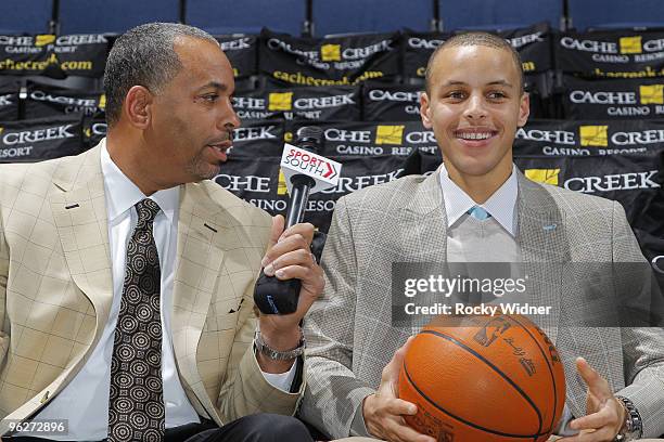 Former NBA player Del Curry interviews his son Stephen Curry of the Golden State Warriors on January 29, 2010 at Oracle Arena in Oakland, California....