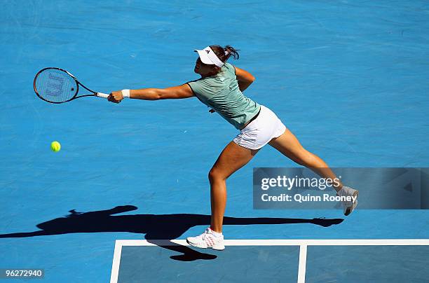 Laura Robson of Great Britain plays a backhand in her junior girls' singles final match against Karolina Pliskova of the Czech Republic during day...