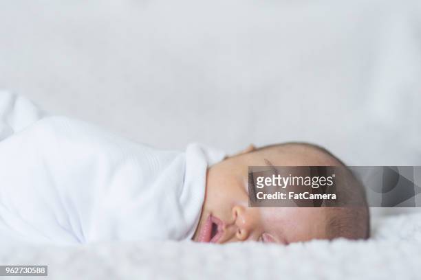 newborn sleeping baby - latin american and hispanic ethnicity newborn stock pictures, royalty-free photos & images