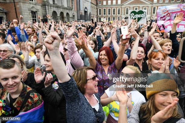 Supporters celebrate at Dublin Castle following the result Irish referendum result on the 8th amendment, concerning the country's abortion laws, on...