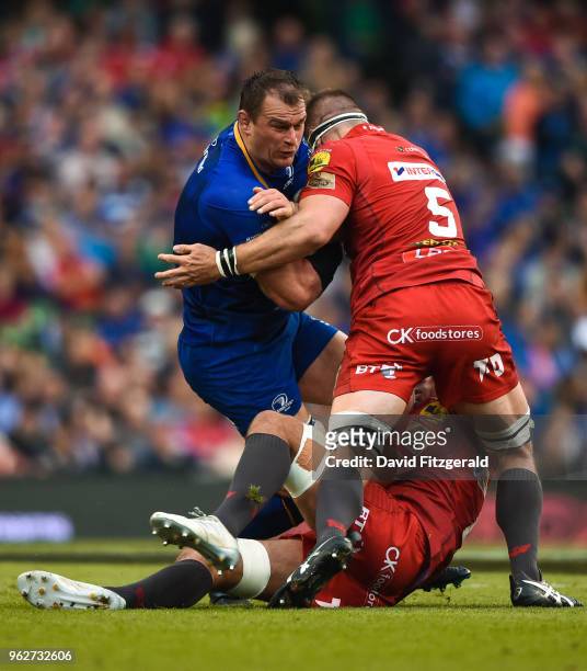 Dublin , Ireland - 26 May 2018; Rhys Ruddock of Leinster is tackled by Scott Williams, bottom, and Steve Cummins of Scarlets during the Guinness...