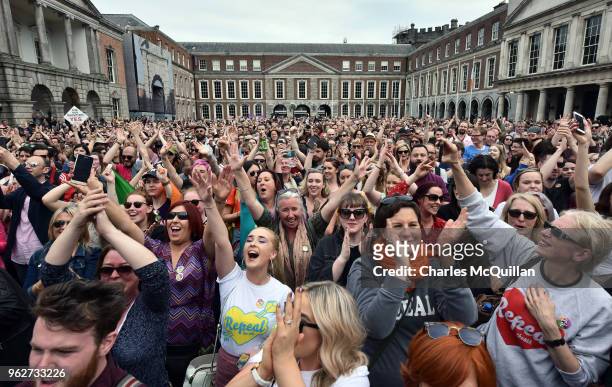 Yes voters celebrate as the result of the Irish referendum on the 8th amendment, concerning the country's abortion laws, is declared at Dublin Castle...