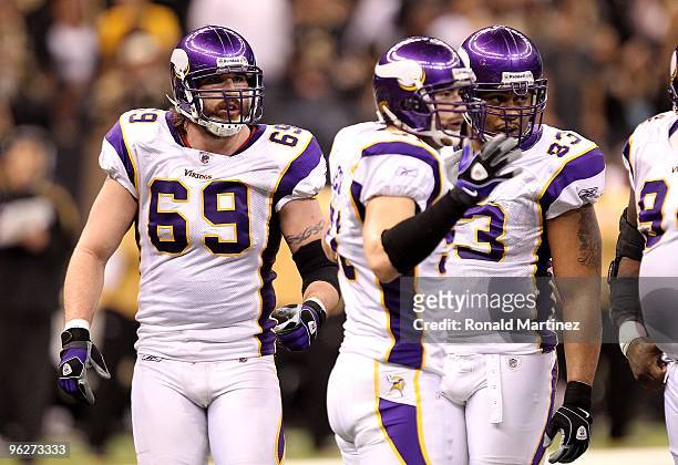 Jared Allen of the Minnesota Vikings looks on as he stands in the huddle against the New Orleans Saints during the NFC Championship Game at the...