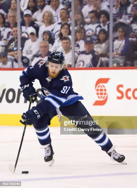 Kyle Connor of the Winnipeg Jets plays the puck down the ice during third period action against the Vegas Golden Knights in Game Five of the Western...