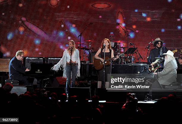 Musicians Elton John, Sheryl Crow, Neko Case and Leon Russell perform onstage at the 2010 MusiCares Person Of The Year Tribute To Neil Young at the...