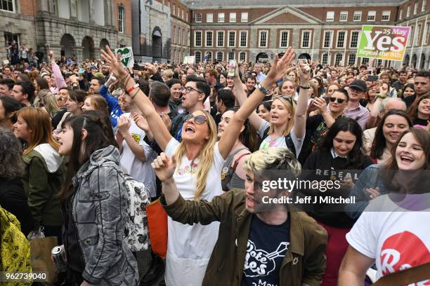 Supporters celebrate at Dublin Castle following the result Irish referendum result on the 8th amendment concerning the country's abortion laws on May...