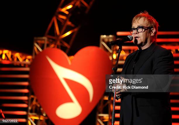 Musician Sir Elton John speaks at the 2010 MusiCares Person Of The Year Tribute To Neil Young at the Los Angeles Convention Center on January 29,...