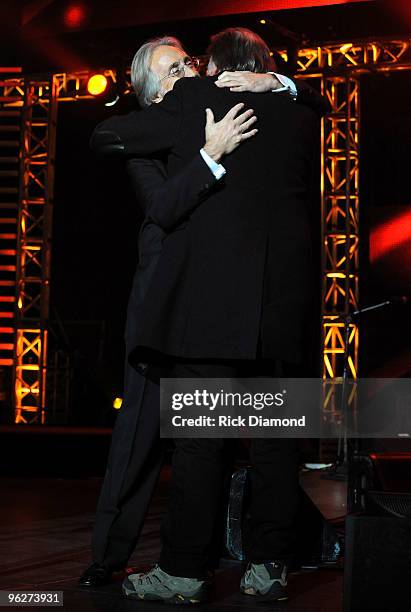 President of the National Academy of Recording Arts and Sciences Neil Portnow and MusiCares Person of the Year musician Neil Young speak at the 2010...