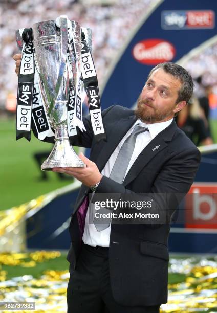 Slavisa Jokanovic, Manager of Fulham celebrates with the trophy following his sides victory in the Sky Bet Championship Play Off Final between Aston...