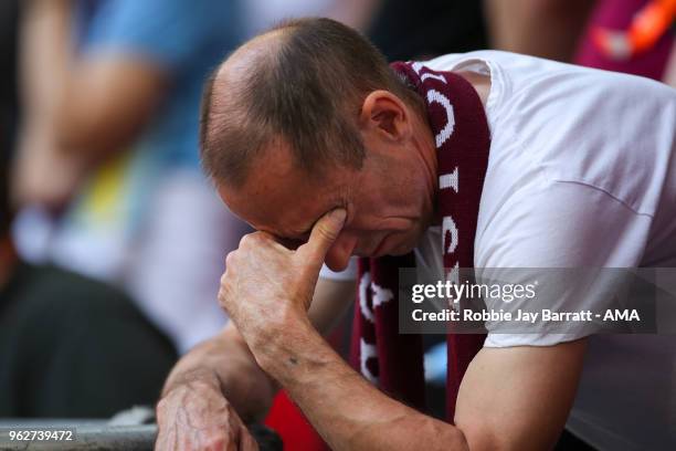 Dejected fan of Aston Villa during the Sky Bet Championship Play Off Final between Aston Villa and Fulham at Wembley Stadium on May 26, 2018 in...