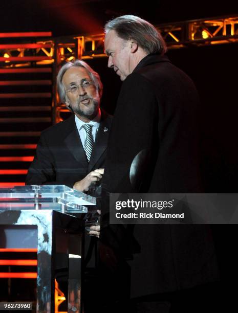 President of the National Academy of Recording Arts and Sciences Neil Portnow and MusiCares Person of the Year musician Neil Young speak at the 2010...