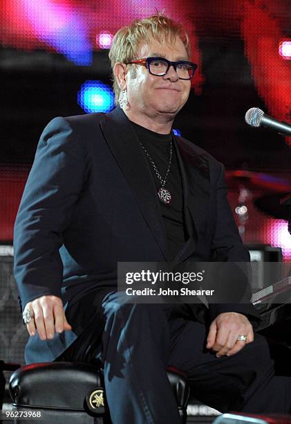 Sir Elton John performs at the 2010 MusiCares Person Of The Year Tribute To Neil Young at the Los Angeles Convention Center on January 29, 2010 in...