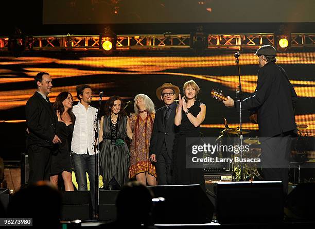 Musicians Dave Matthews, guest, Jason Mraz, Emmylou Harris, Elvis Costello, Shawn Colvin and James Taylor onstage at the 2010 MusiCares Person Of The...
