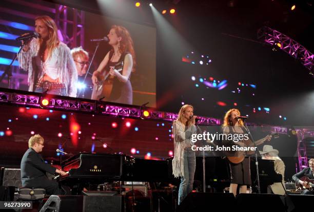 Musicians Sire Elton John, Sheryl Crow and Neko Case perform at the 2010 MusiCares Person Of The Year Tribute To Neil Young at the Los Angeles...