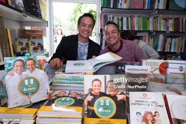 Hermanos Torres attends during the book fair in the Retiro Park in Madrid on May 26, 2018 in Madrid, Spain.