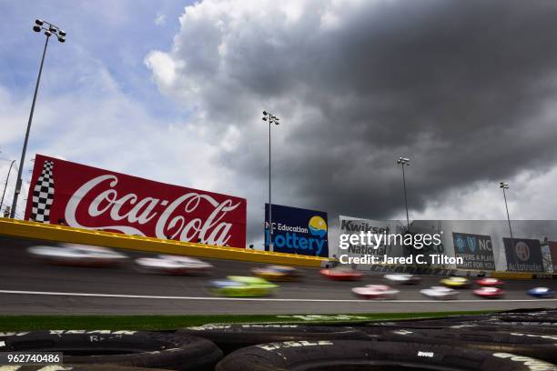 Cars race during the NASCAR Xfinity Series ALSCO 300 at Charlotte Motor Speedway on May 26, 2018 in Charlotte, North Carolina.