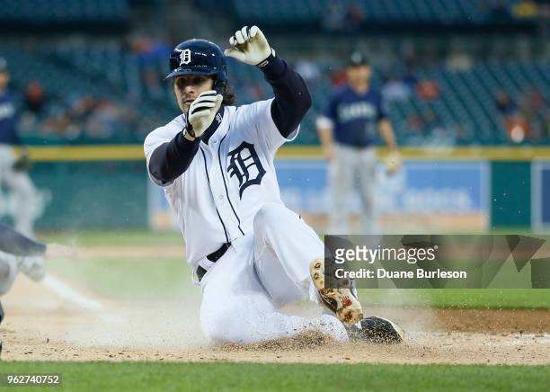 Pete Kozma of the Detroit Tigers scores against the Seattle Mariners during game two of a doubleheader at Comerica Park on May 12, 2018 in Detroit,...