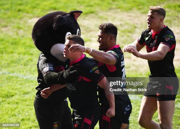 Scott Murrell of Halifax celebrates after he scores their first try during the Rugby League 2018 Summer Bash match between Halifax and Featherstone...