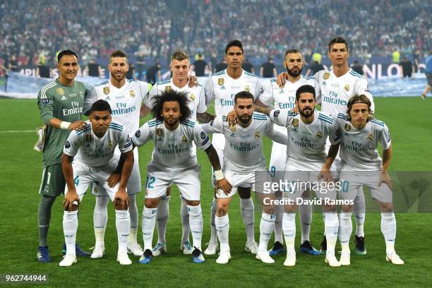 The Real Madrid players line up prior to the UEFA Champions League Final between Real Madrid and Liverpool at NSC Olimpiyskiy Stadium on May 26, 2018...