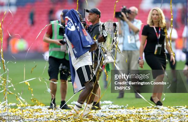 Fulham's Aboubakar Kamara celebrates promotion after the final whistle during the Sky Bet Championship Final at Wembley Stadium Aston Villa v Fulham...