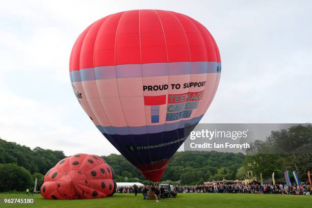 Balloon is inflated to test the strength of the wind as a decision is made about whether to carry out an evening take off during the Durham Hot Air...