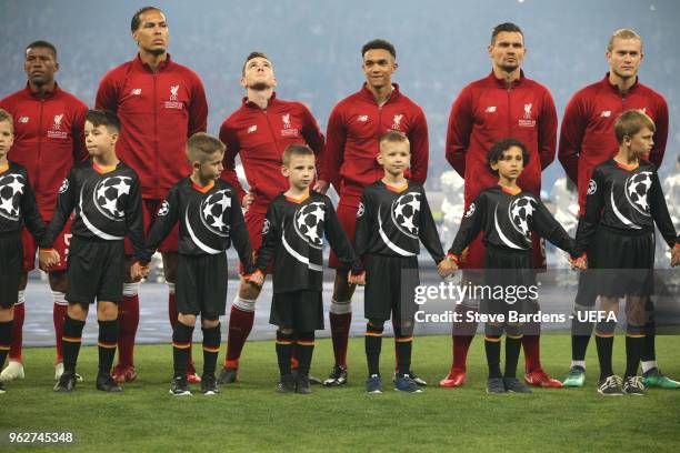 The Liverpool team lines up ahead of the UEFA Champions League Final between Real Madrid and Liverpool at NSC Olimpiyskiy Stadium on May 26, 2018 in...