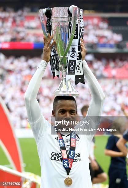 Fulham's Ryan Sessegnon fits the trophy after the final whistle during the Sky Bet Championship Final at Wembley Stadium, London.