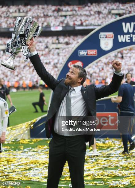 Fulham manager Slavisa Jokanovic celebrates with the Championship Play Off Final trophy during the Sky Bet Championship Play Off Final match between...