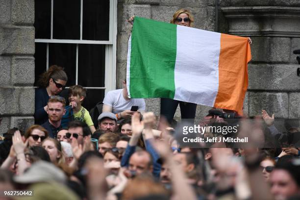 Supporters celebrate at Dublin Castle following the result Irish referendum result on the 8th amendment concerning the country's abortion laws on May...