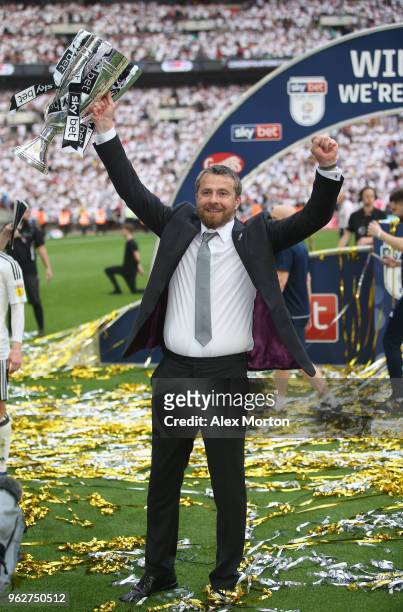 Fulham manager Slavisa Jokanovic celebrates with the Championship Play Off Final trophy during the Sky Bet Championship Play Off Final match between...