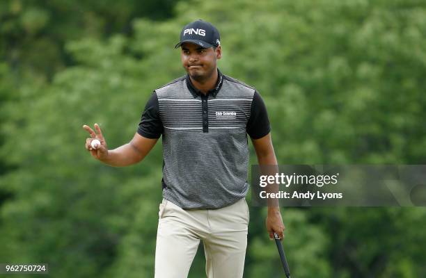 Sebastian Munoz of Columbia waves to the crowd after making his birdie putt on the 4th hole during the third round of the Nashville Golf Open at the...