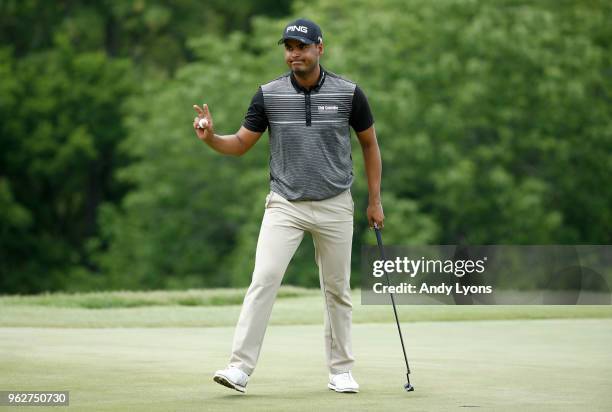 Sebastian Munoz of Columbia waves to the crowd after making his birdie putt on the 4th hole during the third round of the Nashville Golf Open at the...