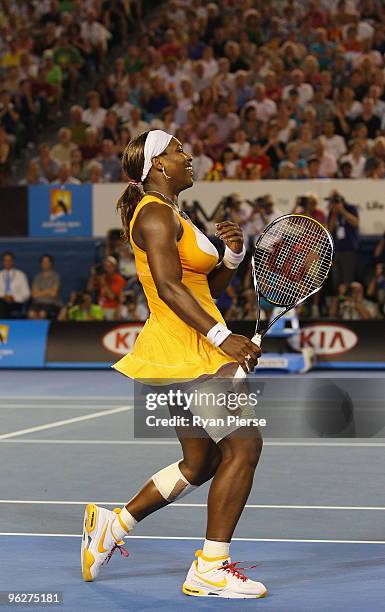 Serena Williams of the United States of America celebrates after winning championship point in her women's final match against Justine Henin of...