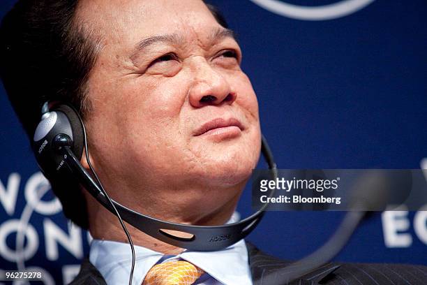 Nguyen Tan Dung, prime minister of Vietnam, attends a panel discussion on day four of the 2010 World Economic Forum annual meeting in Davos,...
