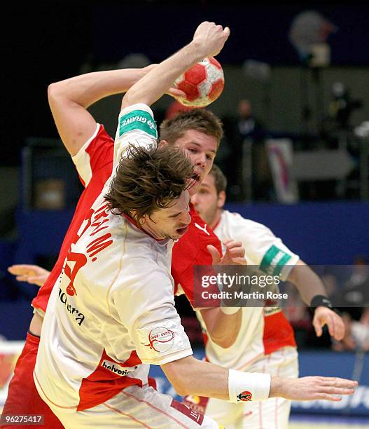 Mikkel Hansen of Denmark shoots over Viran Morros de Argila of Spain during the Men's Handball European qualifyer place 5 match between Denmark and...